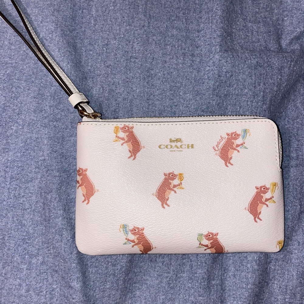 Pig and champagne Coach wristlet